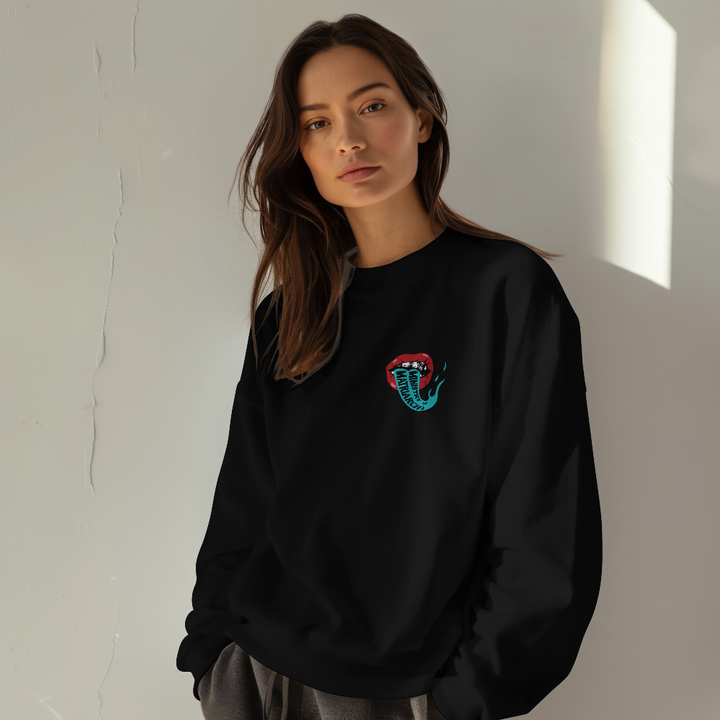 Ministry of Matriarchy crewneck sweatshirt in black worn by a model, front view with small lips chest print
