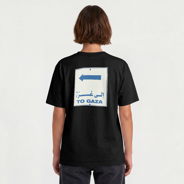 To Gaza classic tee in black worn by a model, back view with To Gaza road sign print